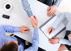 A business meeting shows collaboration and agreement during an rto training session.