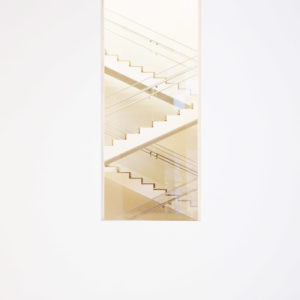 A modern staircase viewed through a glass window highlights innovative training and assessment spaces.