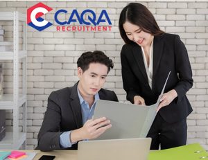 A business professional conducts a job interview, highlighting CAQA recruitment services.