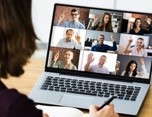 A video conference on a laptop shows participants engaging in online learning, highlighting the importance of the learner.