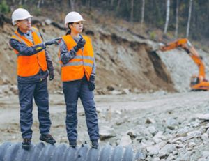 Construction workers inspect a Queensland worksite, highlighting growth in women entering the construction industry.