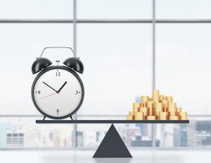 A balance scale illustrates the importance of time management in financial planning for RTOs.