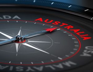 A compass points towards Australia, representing the new skills assessment framework for skilled migrants.