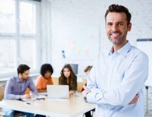 A professional demonstrates effective team leadership during an RTO training session.