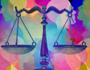 Scales of justice represent inconsistent judgements during VET compliance audits.