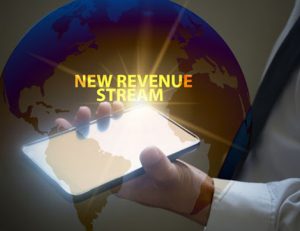 A smartphone shows a world map representing new revenue streams for RTO training.