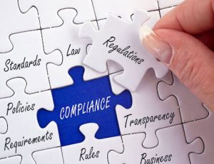 A compliance puzzle piece fits into a larger business puzzle, representing vet compliance.
