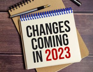 A notepad highlights upcoming changes in 2023 for RTO compliance.